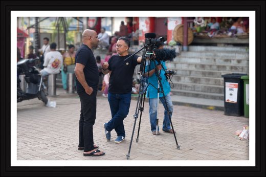 Rajesh Puthanpurayil with filmmaker Haobam Paban Kumar at a shooting location