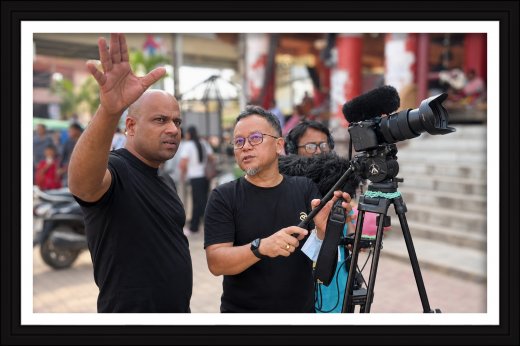 Rajesh Puthanpurayil with filmmaker Haobam Paban Kumar during a documentary shoot at a filming location