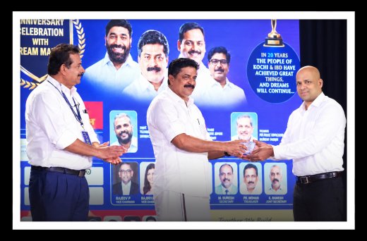 Rajesh Puthanpurayil receiving an award at an award ceremony
