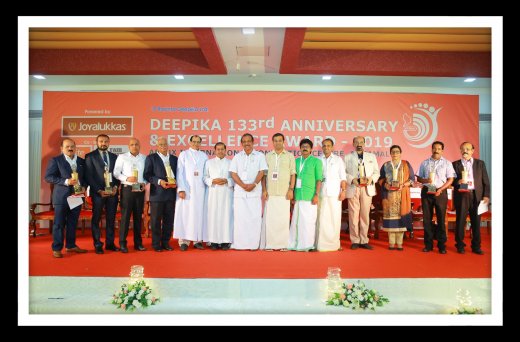 Rajesh Puthanpurayil honored during an award ceremony
