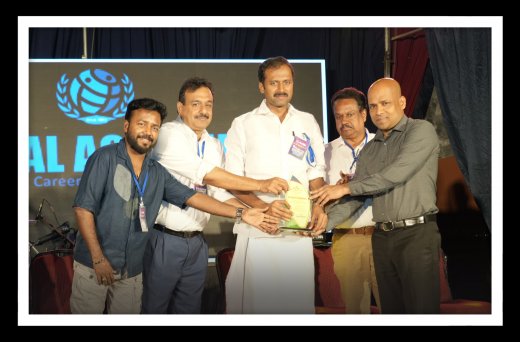 Rajesh Puthanpurayil receiving an award